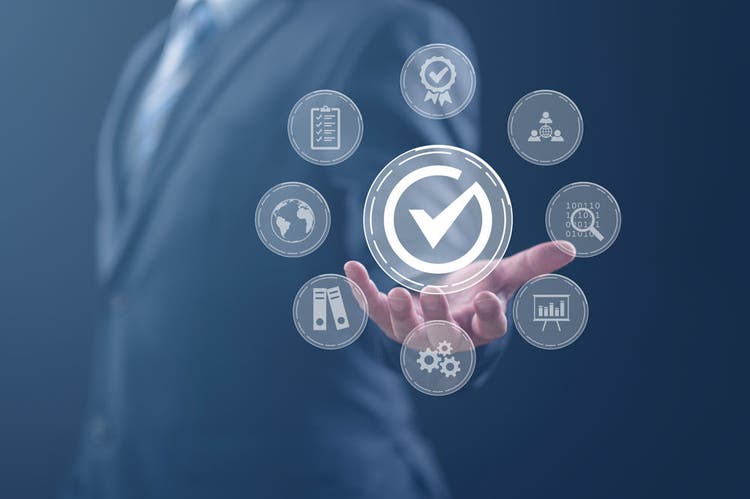 Quality management with Quality Assurance or QA and Quality Control or QC and improvement. Standardization and certification concept. Compliance to regulations and standards. Concept with manager.